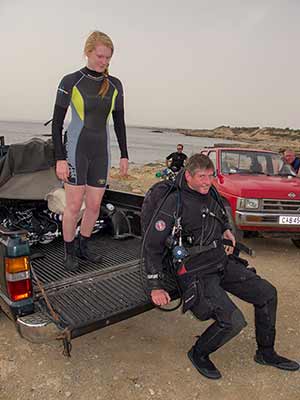 rich walker the gue fundamentals instructor gets kitted up by Scuba Tech divemaster, lucy