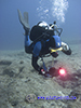 diver with underwater video camera